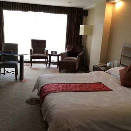 Langzhong Grand Hotel Shahepu Bagian luar foto